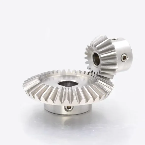 Oblique view of a large and a small bevel gear shown together