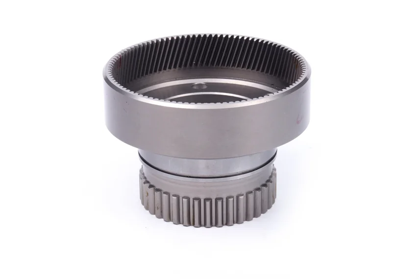 Cylindrical component with internal helical teeth and external teeth