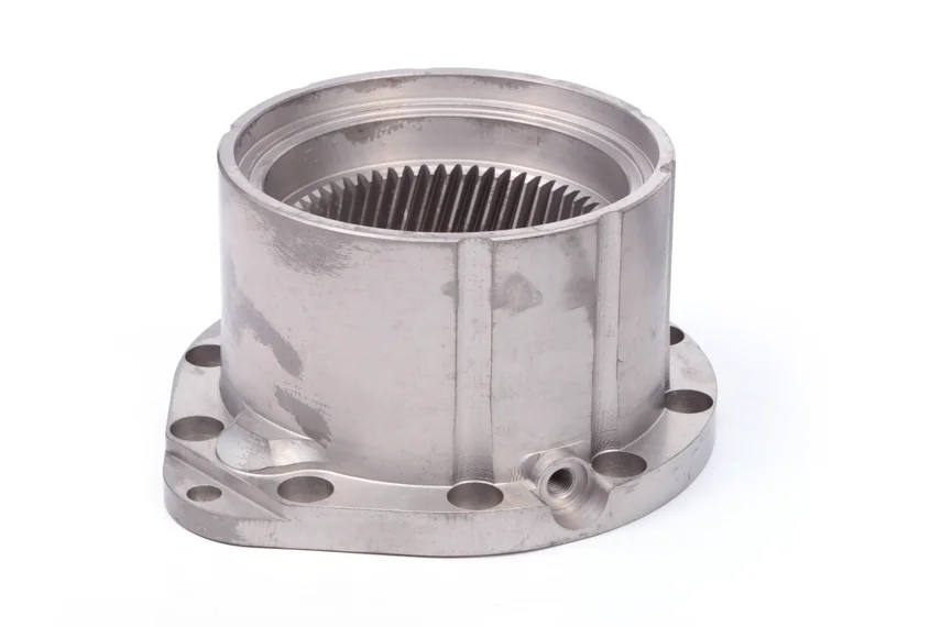 Another view of a flanged cylindrical component with internal helical teeth