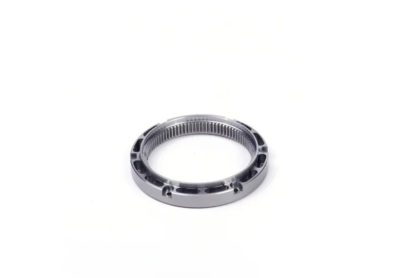 Oblique view of an internal ring gear with mounting holes around the outer rim