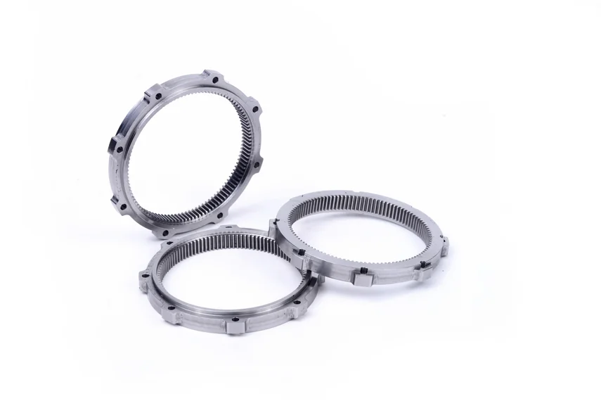A group of three internal ring gears